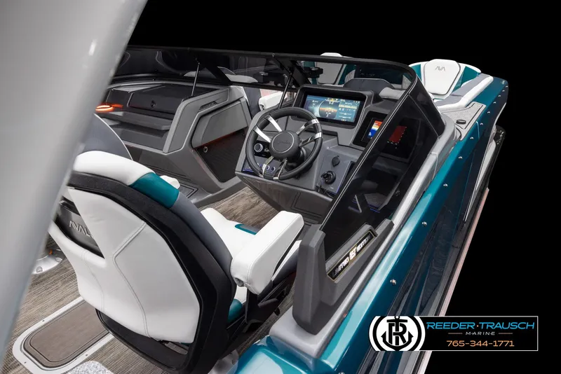 Slide: The Image of 2024 Avalon Excalibur VRB boat cockpit with modern steering and control panel. - 4
