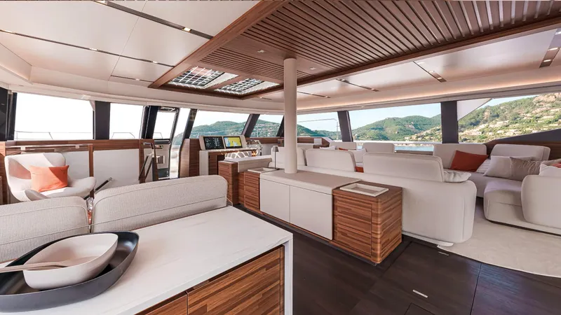 Slide: The Image of Luxurious interior of 2025 Fountaine Pajot Thira 80 yacht with modern design and scenic views. - 16