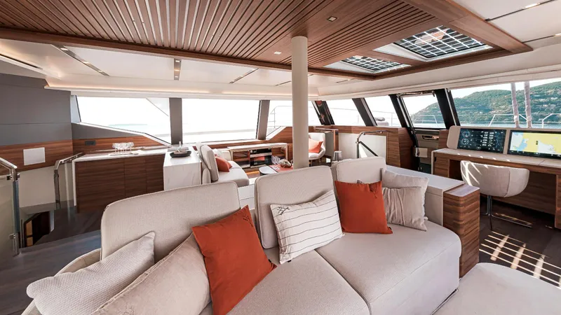 Slide: The Image of Luxurious interior of 2025 Fountaine Pajot Thira 80 yacht with modern design and plush seating. - 18
