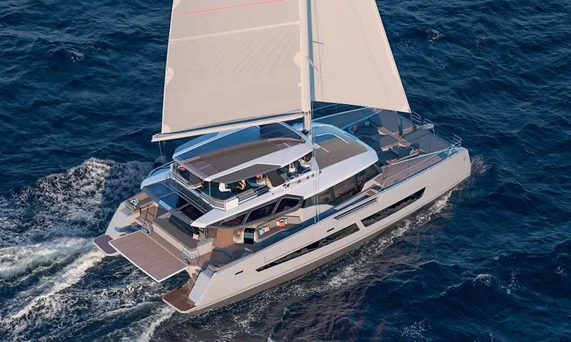 Slide: The Image of Luxury Fountaine Pajot Thira 80 catamaran sailing on open sea, 2026 model. - 2