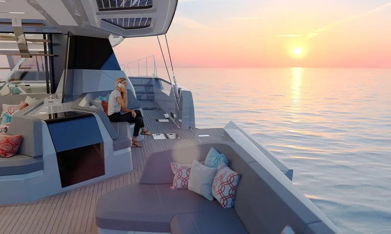 Slide: The Image of Luxury Fountaine Pajot Thira 80 yacht at sunset, 2026 model, with elegant seating and ocean view. - 4
