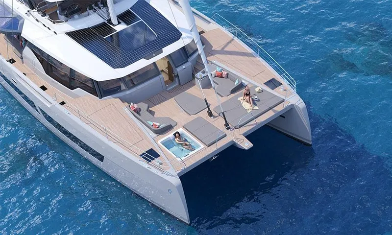 Slide: The Image of Luxury Fountaine Pajot Thira 80 yacht, 2026 model, cruising on clear blue waters. - 5