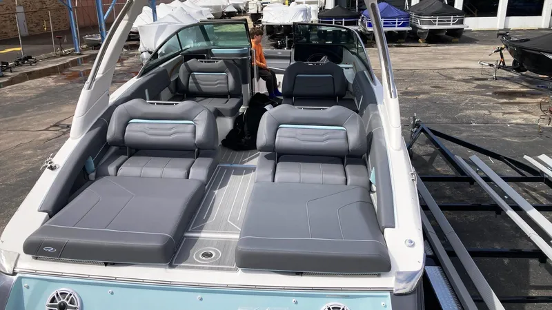 Slide: The Image of 2024 Regal LS9 boat with luxurious seating and modern design. - 10