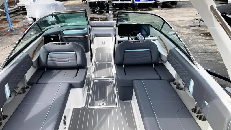 Slide: The Image of 2024 Regal LS9 boat interior with luxurious seating and modern design. - 11