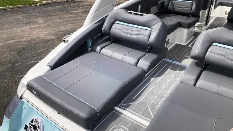 Slide: The Image of 2024 Regal LS9 boat interior with luxurious seating and modern design. - 12