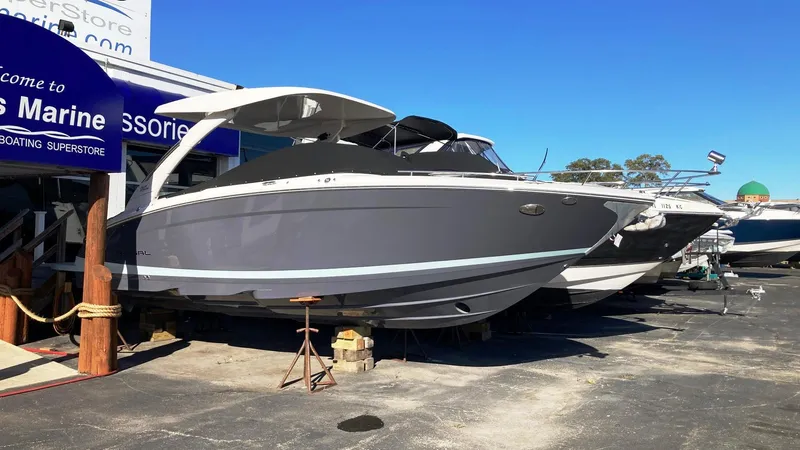 Slide: The Image of 2024 Regal LS9 boat displayed at a marine accessories store. - 4