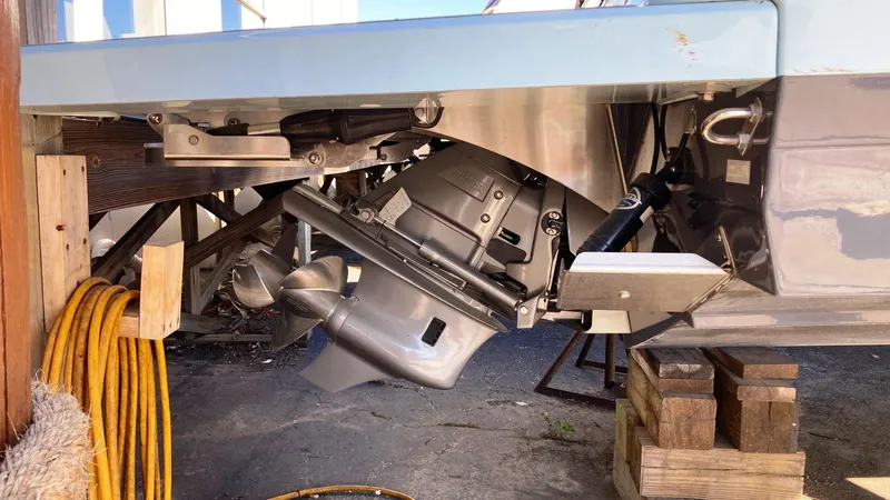 Slide: The Image of 2024 Regal LS9 boat engine and propeller on wooden blocks. - 7