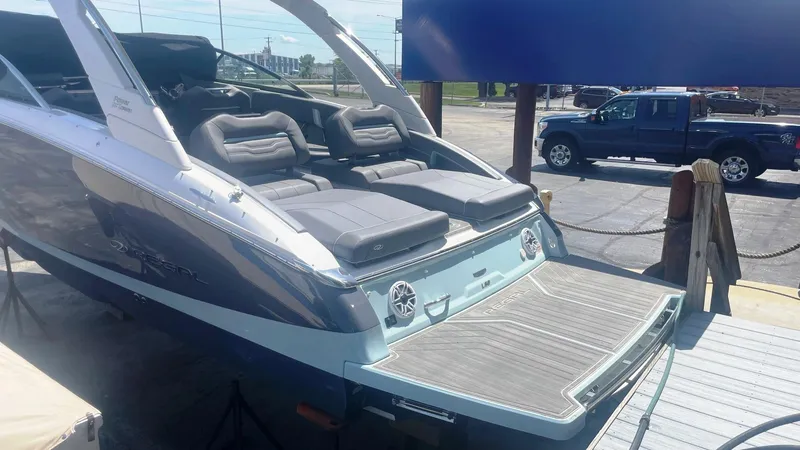 Slide: The Image of 2024 Regal LS9 boat with sleek design and luxurious seating on display. - 8