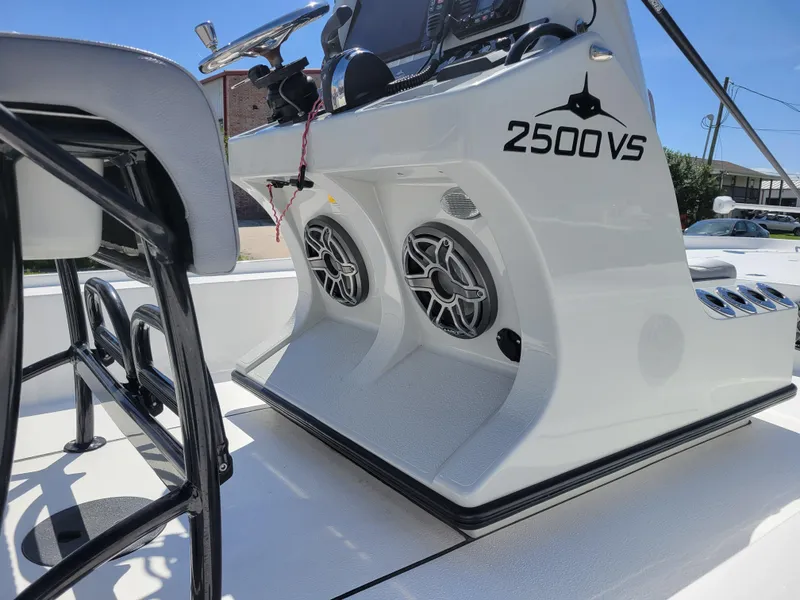 Slide: The Image of 2022 Turner Boatworks 2500 VS center console with dual speakers. - 12