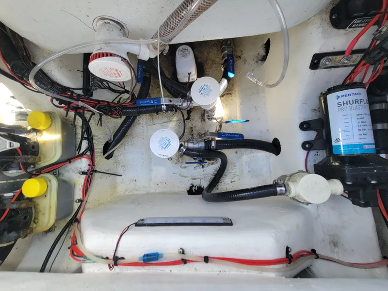 Slide: The Image of 2022 Turner Boatworks 2500 VS engine compartment with wiring and components. - 16