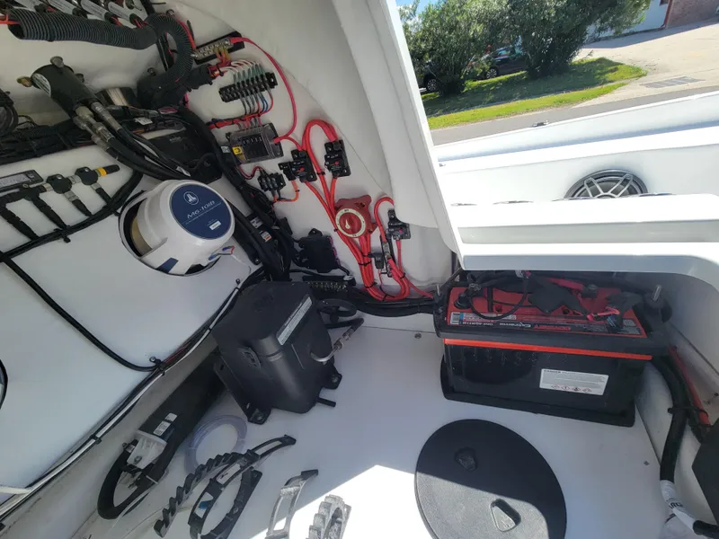 Slide: The Image of 2022 Turner Boatworks 2500 VS electrical system and battery compartment. - 25
