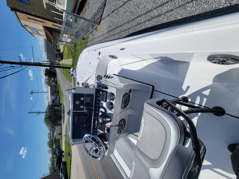 Slide: The Image of 2022 Turner Boatworks 2500 VS, sleek white interior, modern dashboard, and comfortable seating. - 26