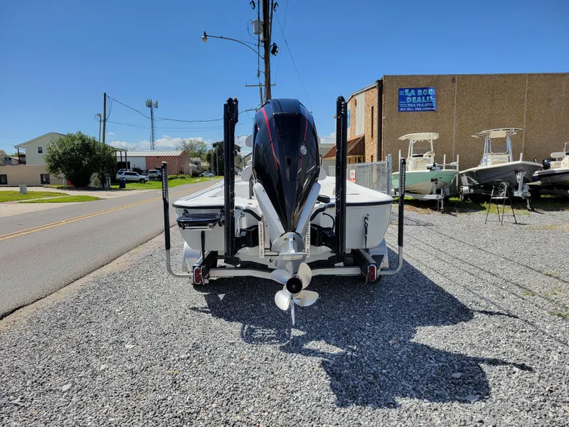 Slide: The Image of 2022 Turner Boatworks 2500 VS boat on gravel lot, rear view. - 4