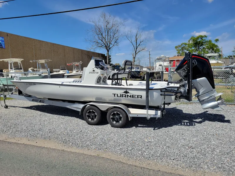 Slide: The Image of 2022 Turner Boatworks 2500 VS on a trailer in a boatyard. - 6
