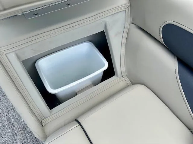 Slide: The Image of Built-in trash bin in the 2024 Barletta Aria 24QC boat. - 11