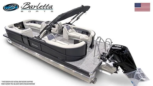 Slide: The Image of 2024 Barletta Aria 24QC pontoon boat with black exterior and spacious seating. - 2