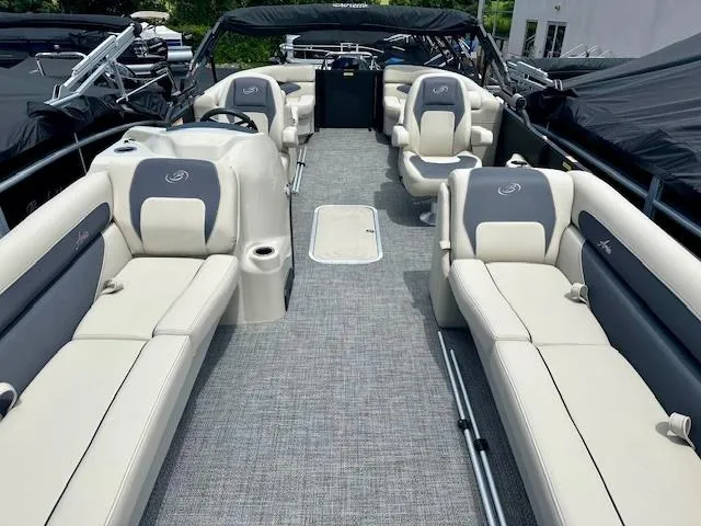 Slide: The Image of 2024 Barletta Aria 24QC pontoon boat with spacious seating and modern interior design. - 3