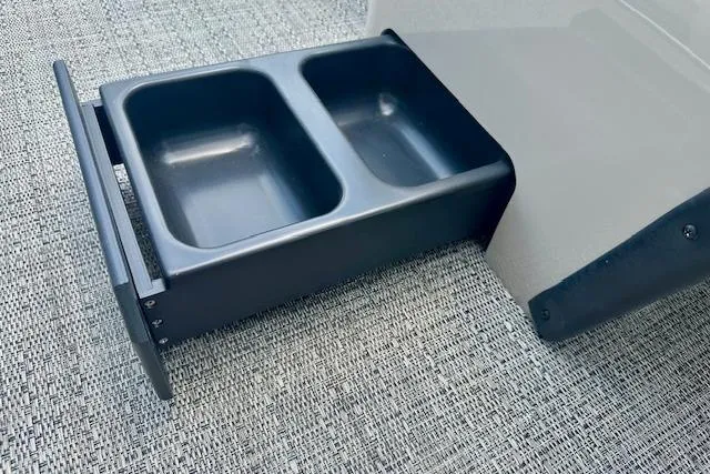 Slide: The Image of 2024 Barletta Aria 24UC boat cup holder on textured flooring. - 12