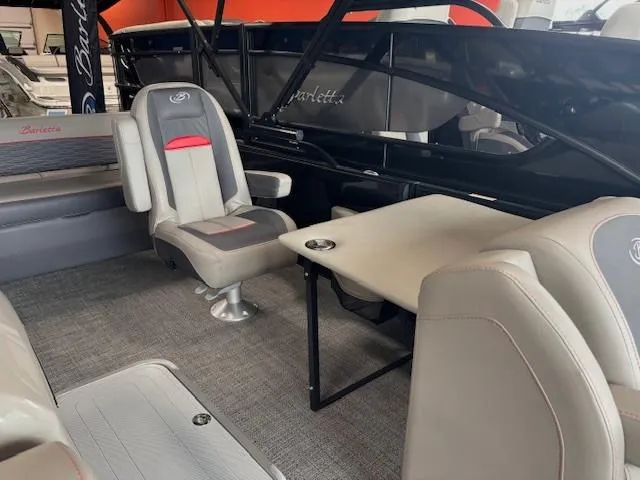 Slide: The Image of 2024 Barletta CORSA 25UC interior with seating and table, showcasing luxury and comfort. - 10