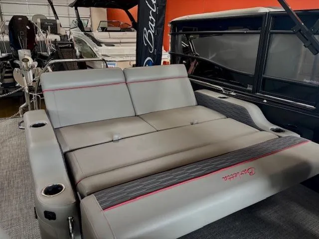 Slide: The Image of 2024 Barletta CORSA 25UC boat interior with gray seating and red accents. - 14