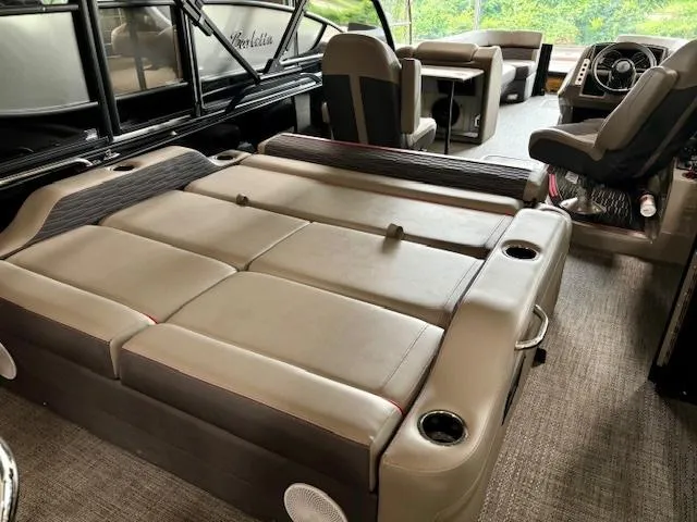 Slide: The Image of 2024 Barletta CORSA 25UC pontoon boat interior with spacious seating and modern design. - 15