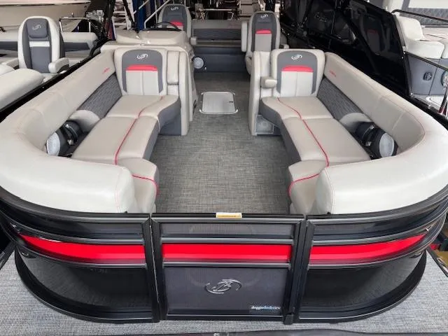 Slide: The Image of 2024 Barletta CORSA 25UC pontoon boat with spacious seating and modern design. - 2