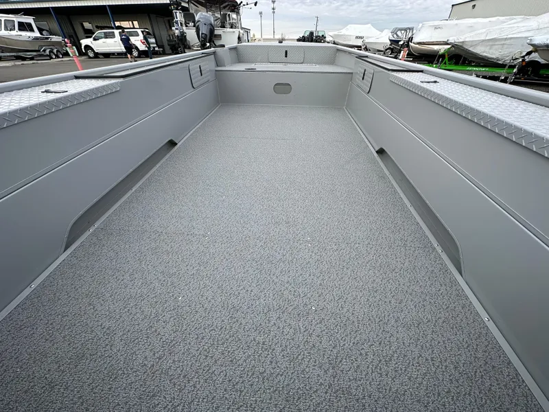 Slide: The Image of 2023 Smoker Craft Sportsman Pro 1866 boat interior, spacious and durable design. - 4