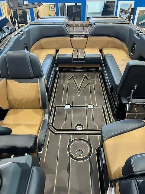 Slide: The Image of 2024 Supra SL boat interior with luxurious seating and modern design. - 10