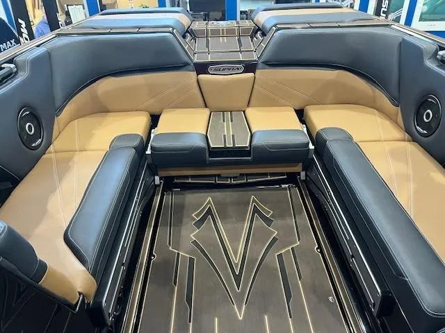 Slide: The Image of 2024 Supra SL boat interior with luxurious seating and stylish design. - 14