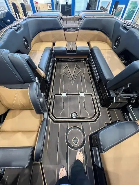 Slide: The Image of 2024 Supra SL boat interior with luxurious seating and modern design. - 17