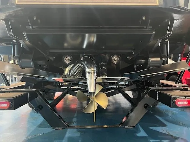 Slide: The Image of 2024 Supra SL boat propeller and rudder system. - 8