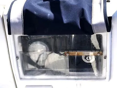 Slide: The Image of Control panel of a 1990 Hunter Vision 32 sailboat, partially covered. - 26