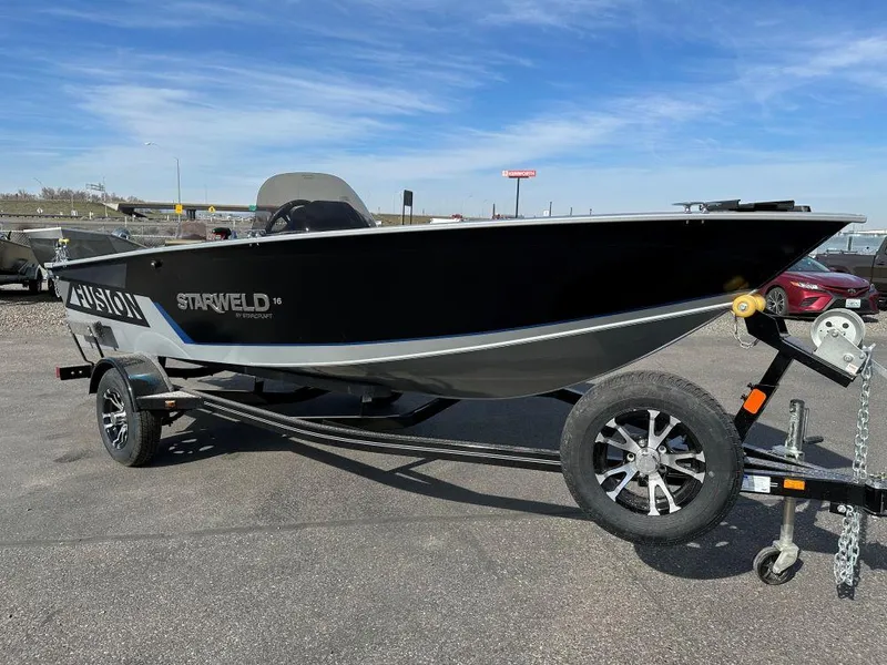 The Image of 2024 Starweld 16 Fusion SC Pro fishing boat on a trailer. - 0