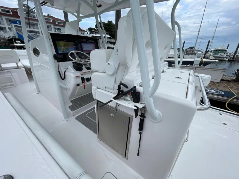 Slide: The Image of 2018 Southport 33 FE boat cockpit with helm station and seating. - 20