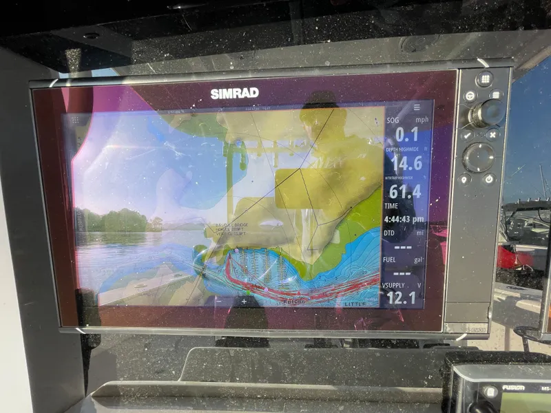 Slide: The Image of 2018 Southport 33 FE boat with Simrad navigation display. - 28