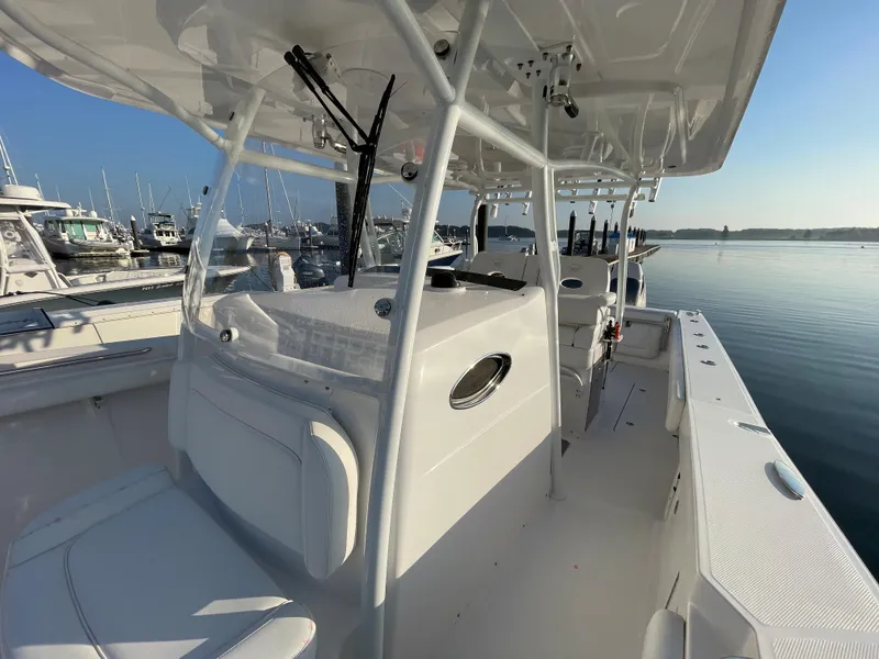 Slide: The Image of 2018 Southport 33 FE boat interior at marina with calm water. - 47