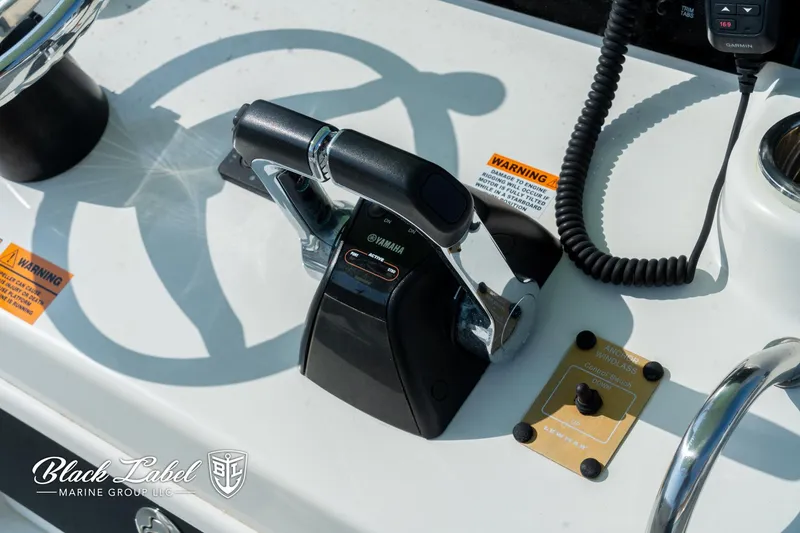 Slide: The Image of Control panel of a 2020 Parker 2801cc boat with Yamaha throttle. - 16