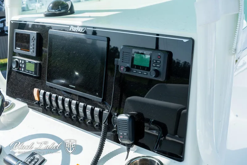 Slide: The Image of Control panel of a 2020 Parker 2801cc boat with navigation equipment. - 20