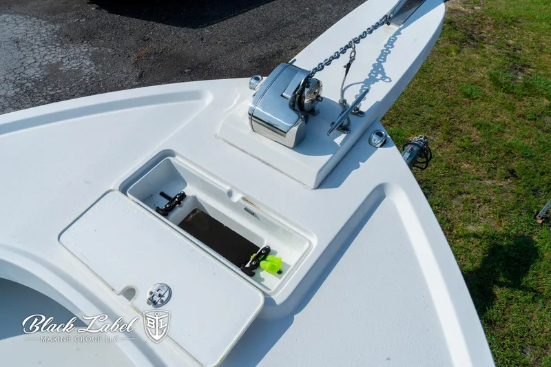 Slide: The Image of Bow of 2020 Parker 2801cc boat with anchor chain and storage compartment. - 8