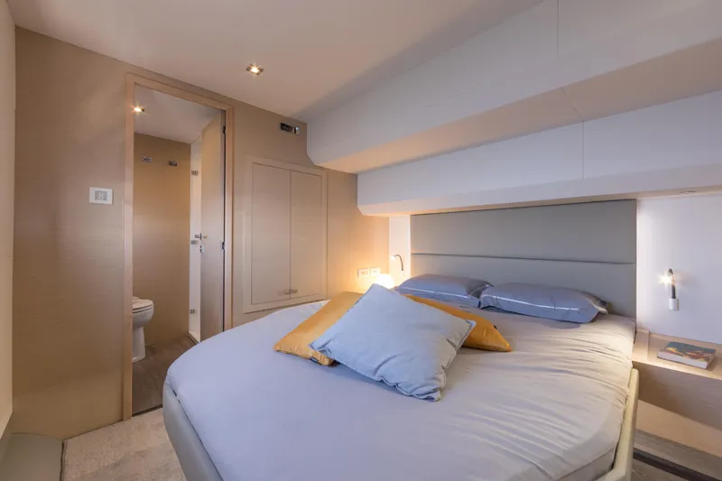Slide: The Image of Luxurious bedroom in 2025 Fountaine Pajot MY 6 yacht with ensuite bathroom. - 9