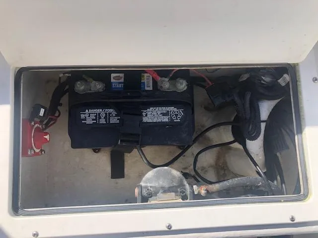 Slide: The Image of Battery compartment of a 2021 May-Craft 1800 Skiff boat. - 12