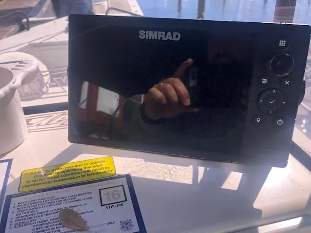 Slide: The Image of Simrad navigation system on a 2021 May-Craft 1800 Skiff boat. - 8