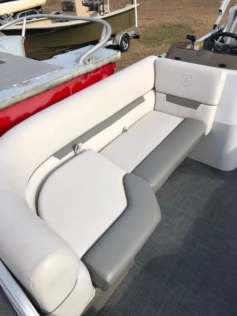 Slide: The Image of 2021 Sweetwater 2286 boat interior with comfortable seating. - 6