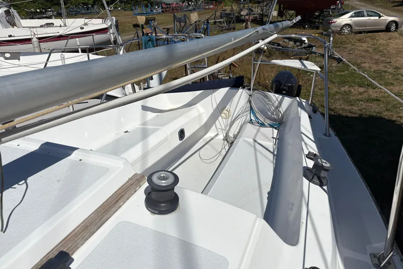 Slide: The Image of Sailboat deck of a 2002 Precision 23, featuring rigging and winches. - 8