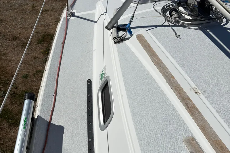 Slide: The Image of Deck of a 2002 Precision 23 sailboat with rigging and hardware. - 9
