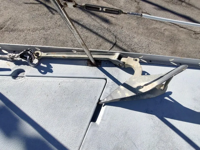 Slide: The Image of Anchor on deck of 1979 Endeavour 32 sailboat, secured with metal fittings. - 15