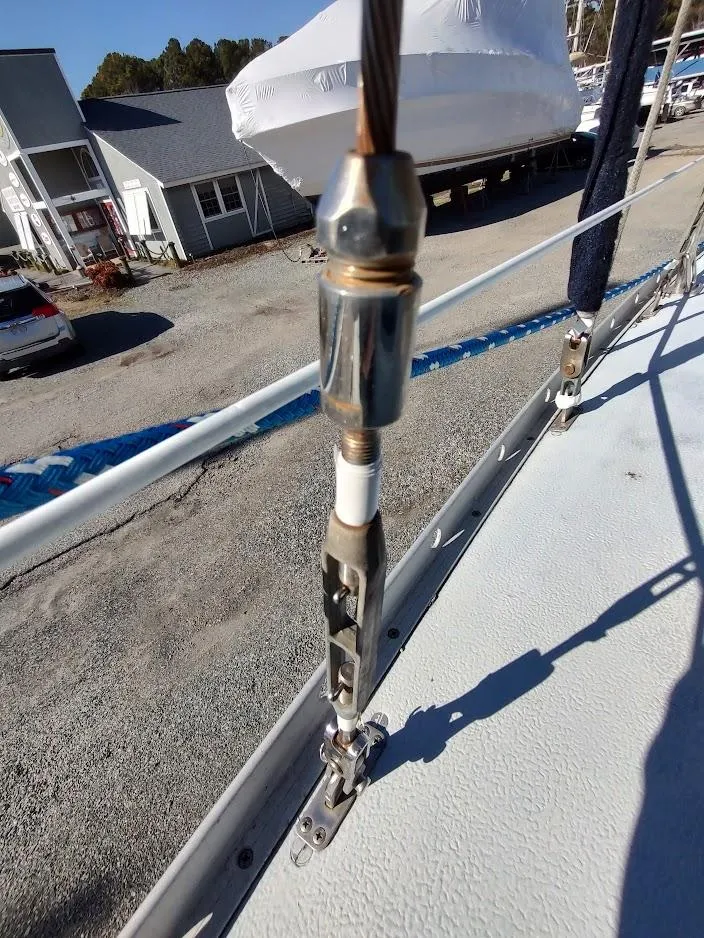 Slide: The Image of Close-up of rigging hardware on a 1979 Endeavour 32 sailboat deck. - 21