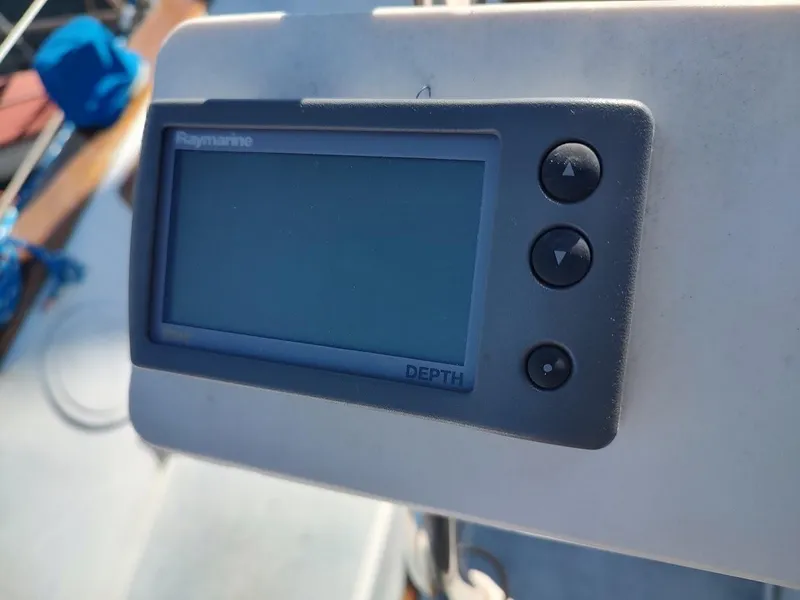Slide: The Image of Raymarine depth gauge on 1979 Endeavour 32 sailboat dashboard. - 25