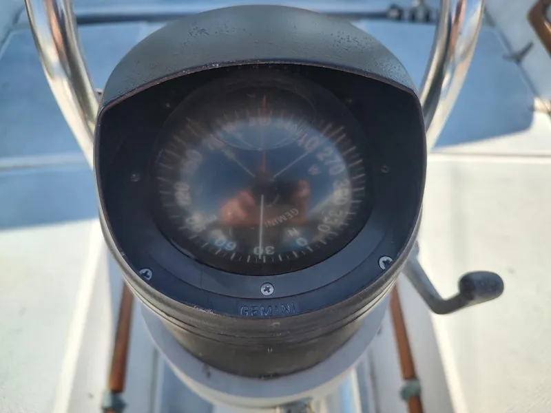 Slide: The Image of Compass on 1979 Endeavour 32 sailboat, showing navigation details. - 27