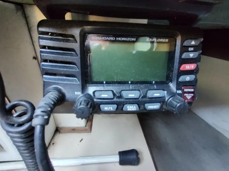 Slide: The Image of Standard Horizon Explorer radio on a 1979 Endeavour 32 sailboat, featuring control buttons and display. - 48